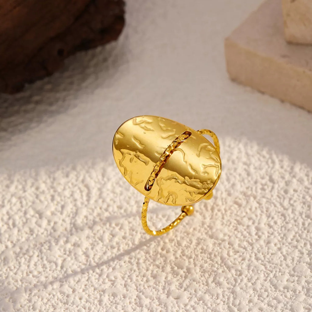 Hammered disc open ring by Shopimist featuring a textured, hammered metal design and open adjustable band for stylish wear.
