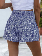 Floral print elastic waist shorts in lightweight fabric with a relaxed fit, perfect for casual summer outfits.