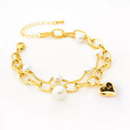 18K gold-plated heart charm bracelet with delicate chain and stylish design, perfect for elegant jewelry collection.