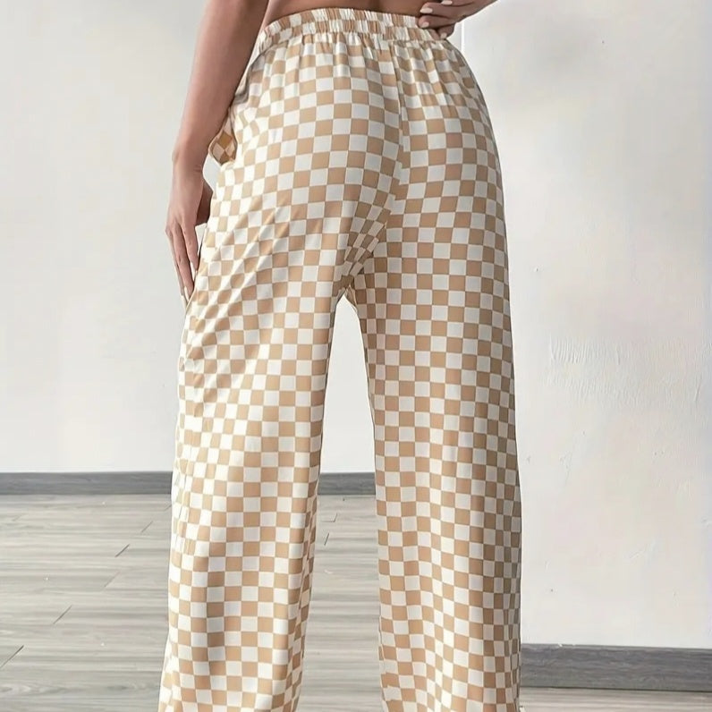 Checkerboard high-waisted wide-leg pants by Plush Fashion Hub in four colors, shown in a stylish fashion photo.