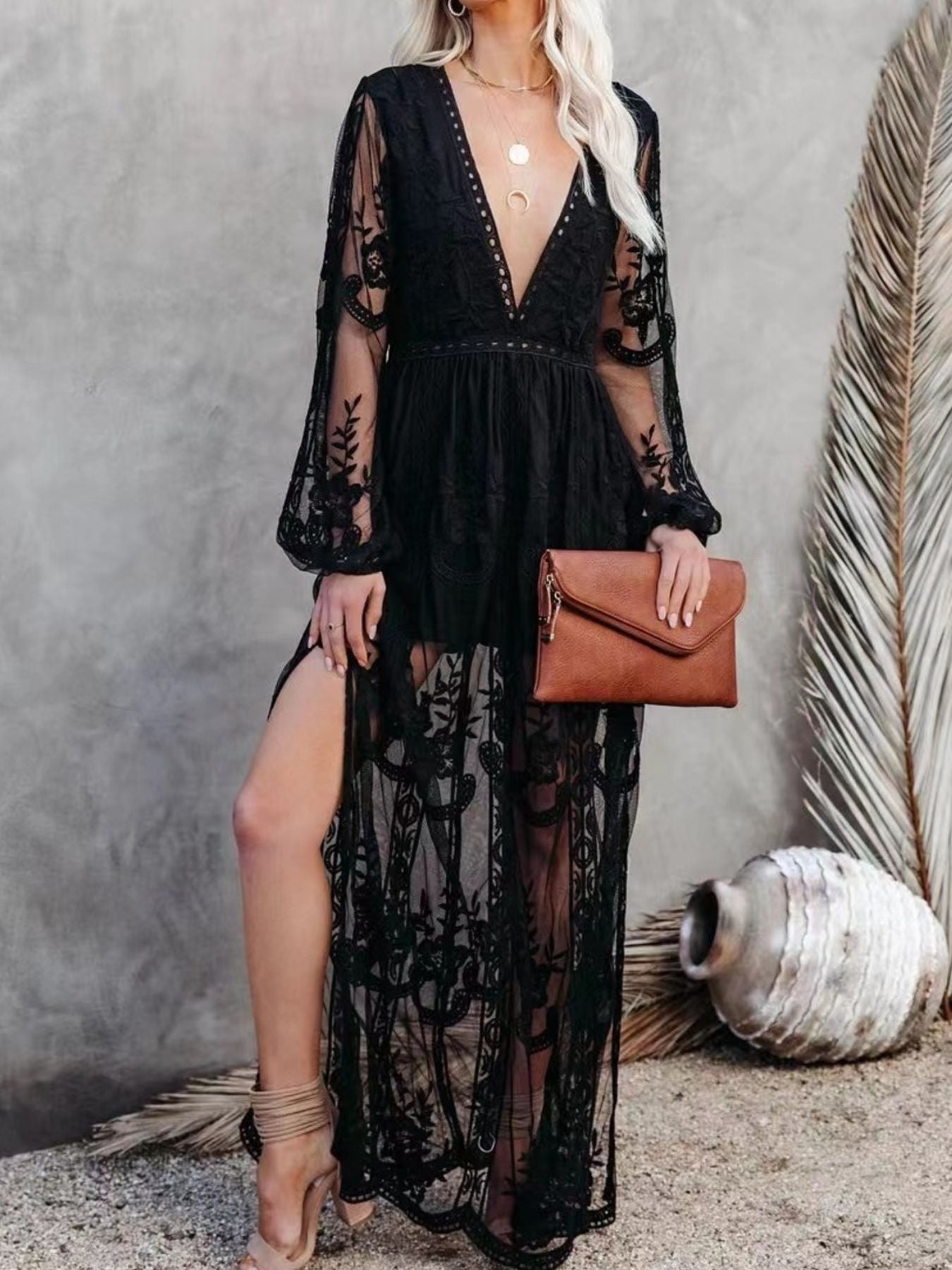 Elegant floral lace high-slit maxi dress by Trendsi, featuring intricate lace details and a flowing formal gown silhouette.