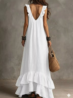 Ruffled sleeveless maxi dress by Shopimist featuring flowing fabric and a stylish ruffled neckline in a vibrant design.