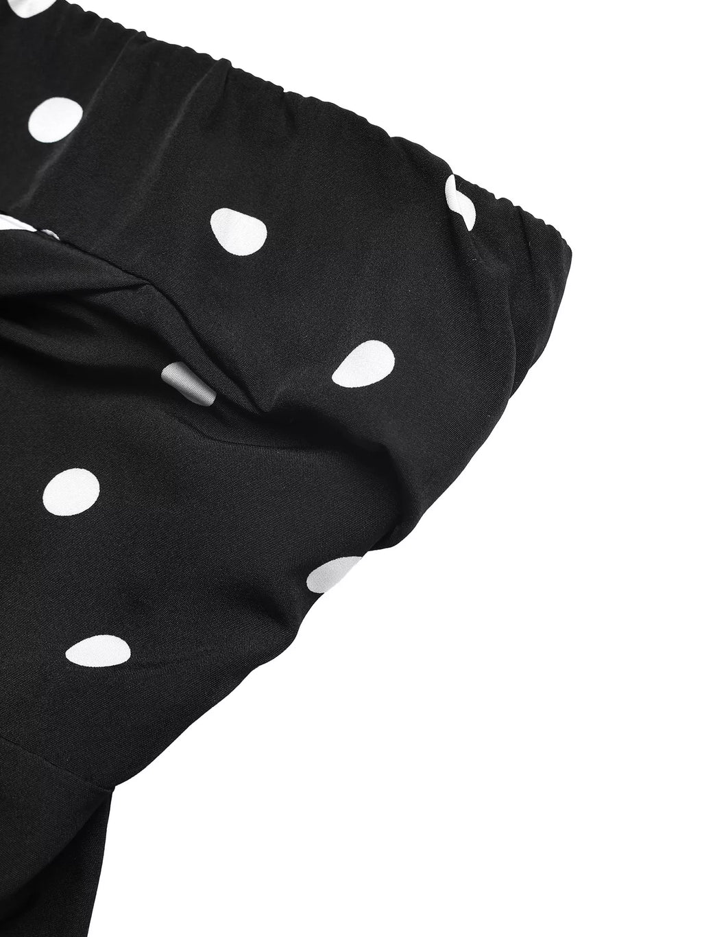 Polka dot strapless wide-leg jumpsuit by Plush Fashion Hub, showing flowy fabric and stylish design for a comfortable look