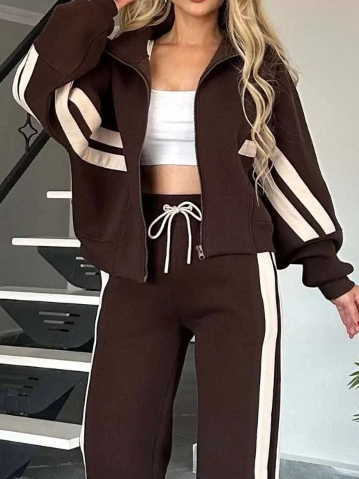 Plus size contrast stripe zip-up jacket and pants activewear set by Plush Fashion Hub, featuring sporty design and comfortable fit.