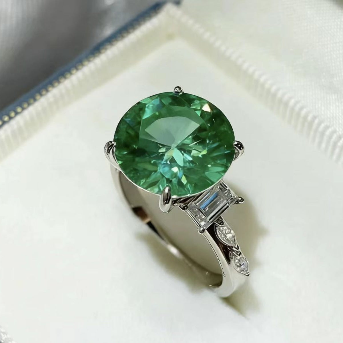 Sterling silver ring with an 8-carat moissanite gemstone, featuring a sleek, elegant design.