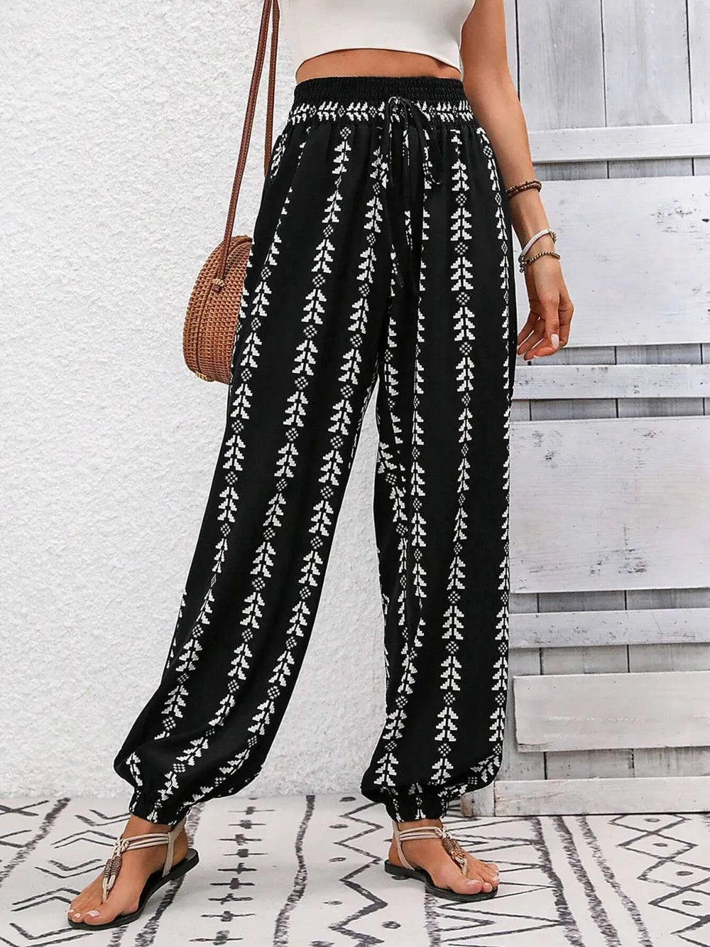 Plush Fashion Hub printed high waist pants featuring a stylish design and comfortable fit, shown on a model.