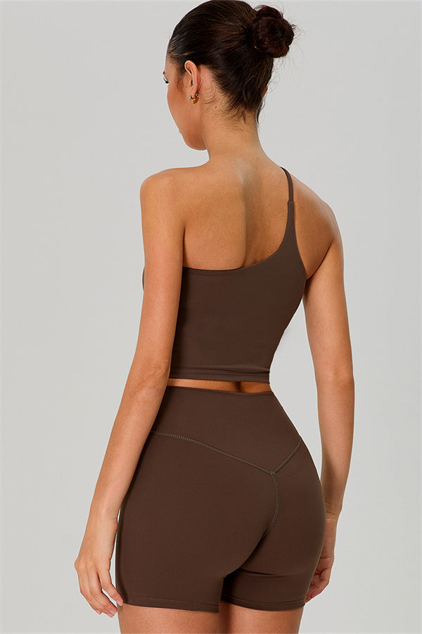 Fitglutes activewear two-piece set with one-shoulder crop top and matching shorts, perfect for gym or workout wear.