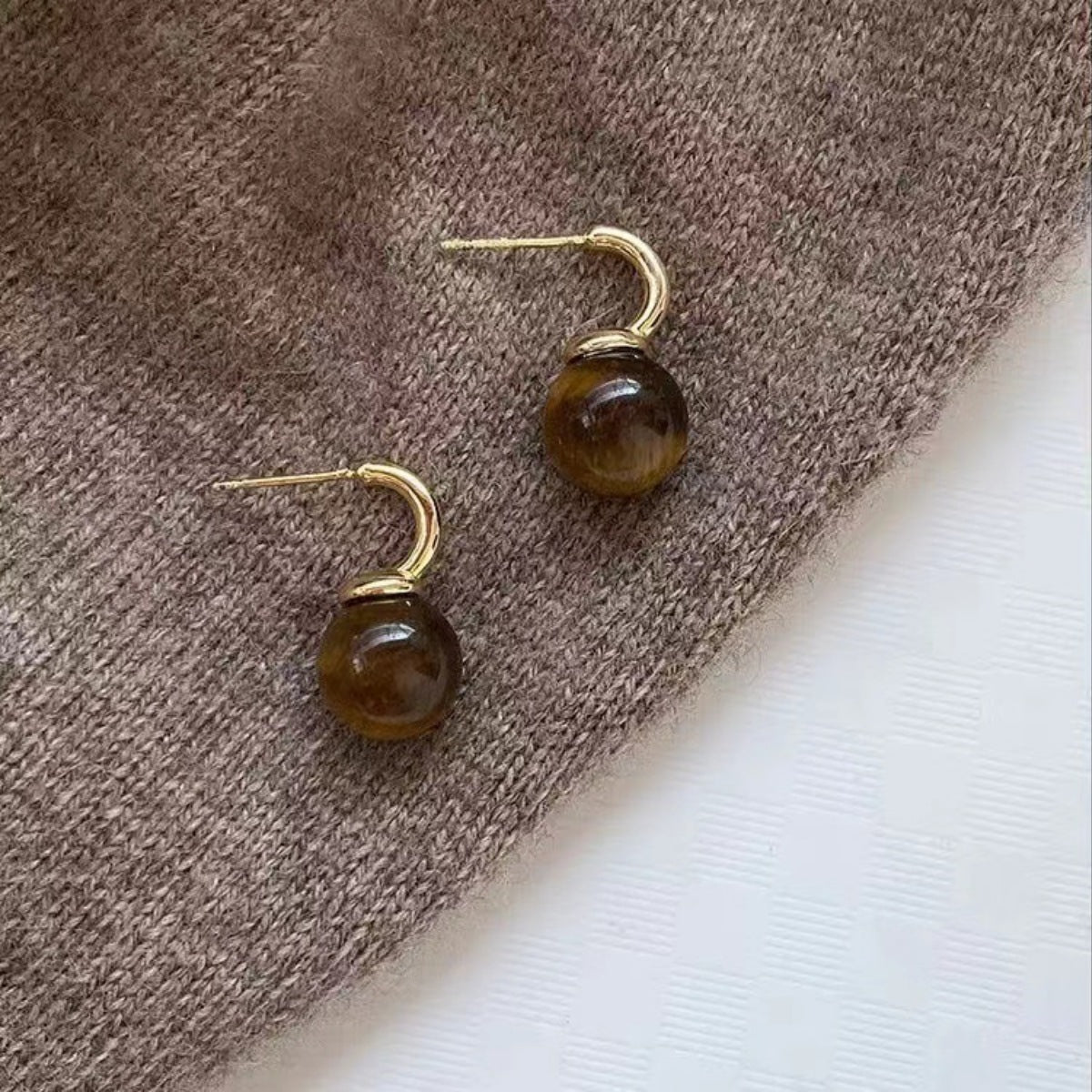 Tiger Eye ball drop earrings by Shopimist featuring polished, round tiger eye stones hanging from delicate earring hooks.