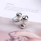 Multi-layered ball ring by Shopimist featuring stacked silver bands with textured ball accents.
