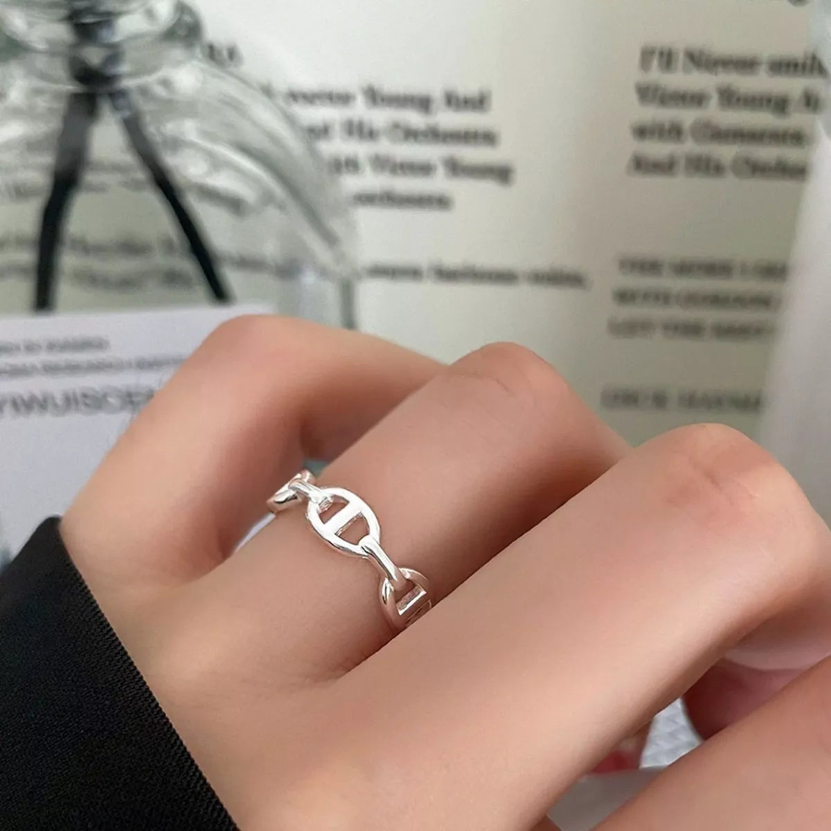 Sterling silver geometric ring with modern design, crafted by Plush Fashion Hub, showcasing clean lines and a sleek finish.