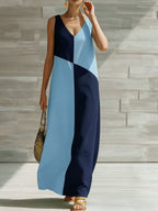 Women's chic color block sleeveless maxi dress by Trendsi, lightweight summer fashion with vibrant color blocks and flowing fabric.
