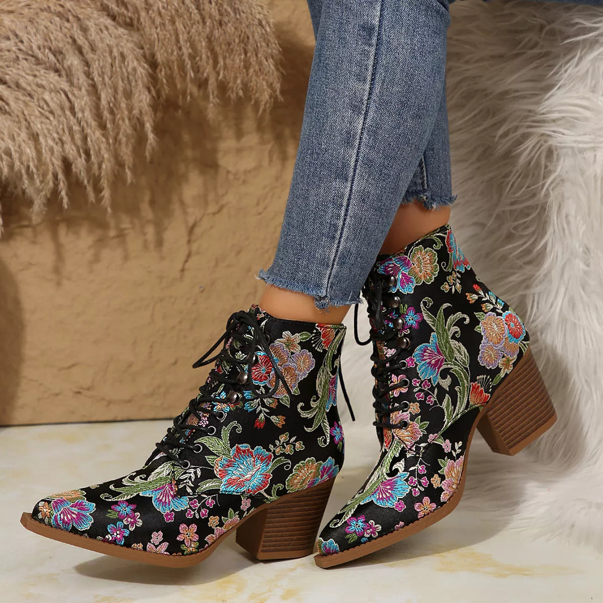 Point toe block heels boots from Trendsi, stylish footwear with a pointed toe design and chunky heel, perfect for dressing up.