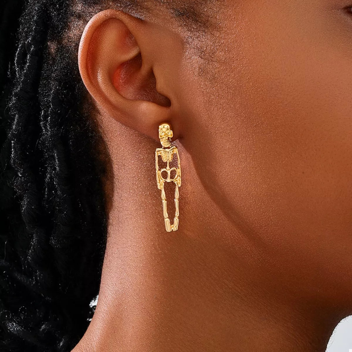 Halloween 18K gold-plated skeleton earrings featuring detailed skeleton designs for a spooky, stylish accessory.