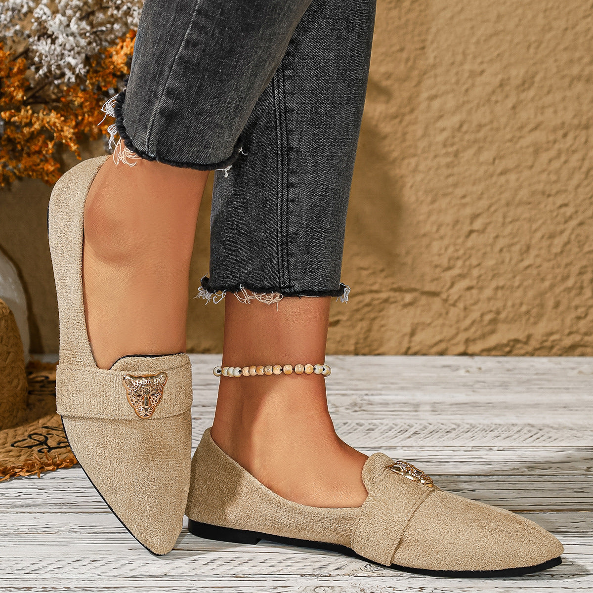 Point toe slip-on footwear by Trendsi featuring sleek design and comfortable fit, ideal for stylish everyday wear.