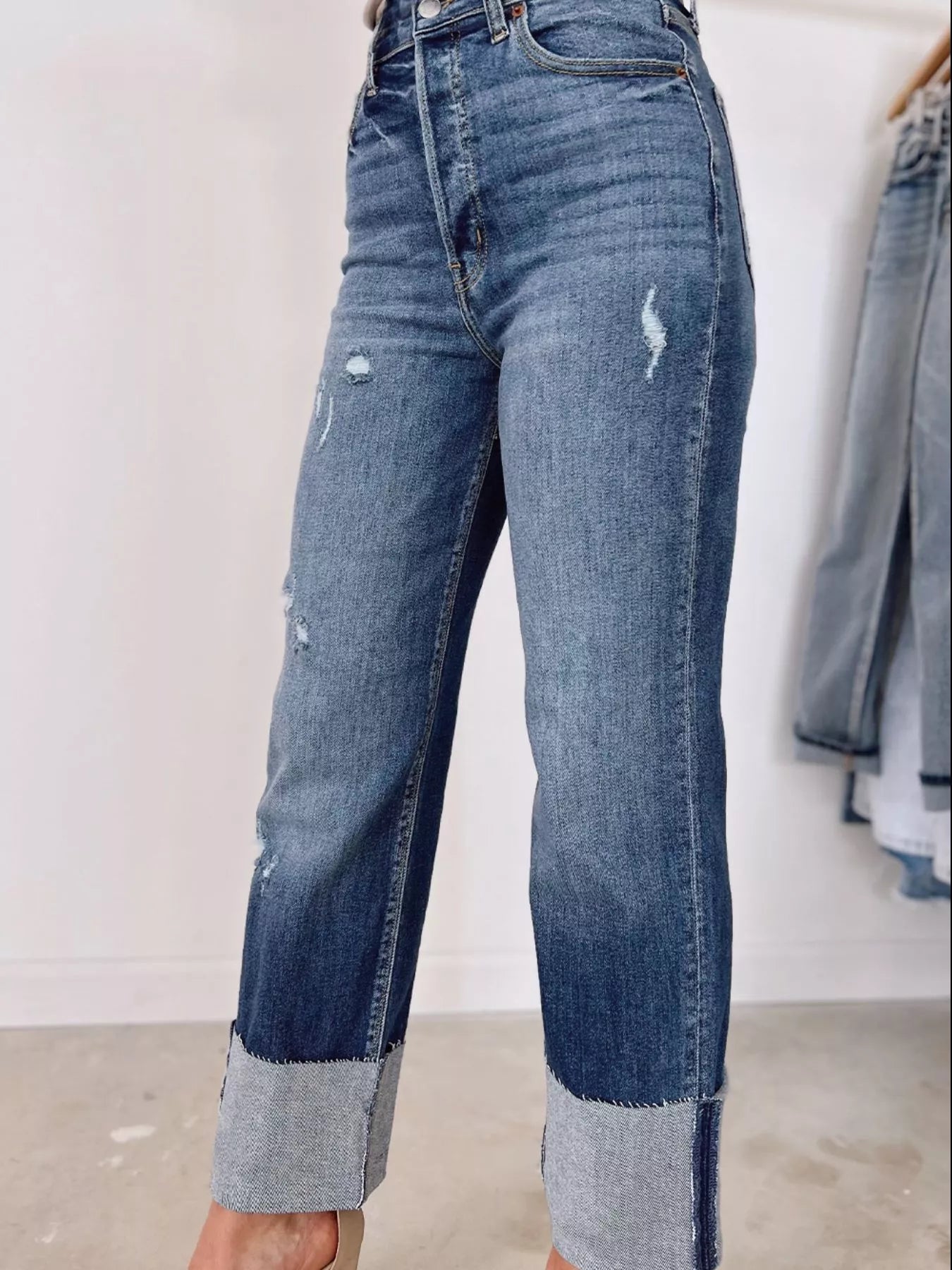 High waist distressed straight leg jeans from Trendsi, featuring a classic denim look with ripped details and a relaxed fit.