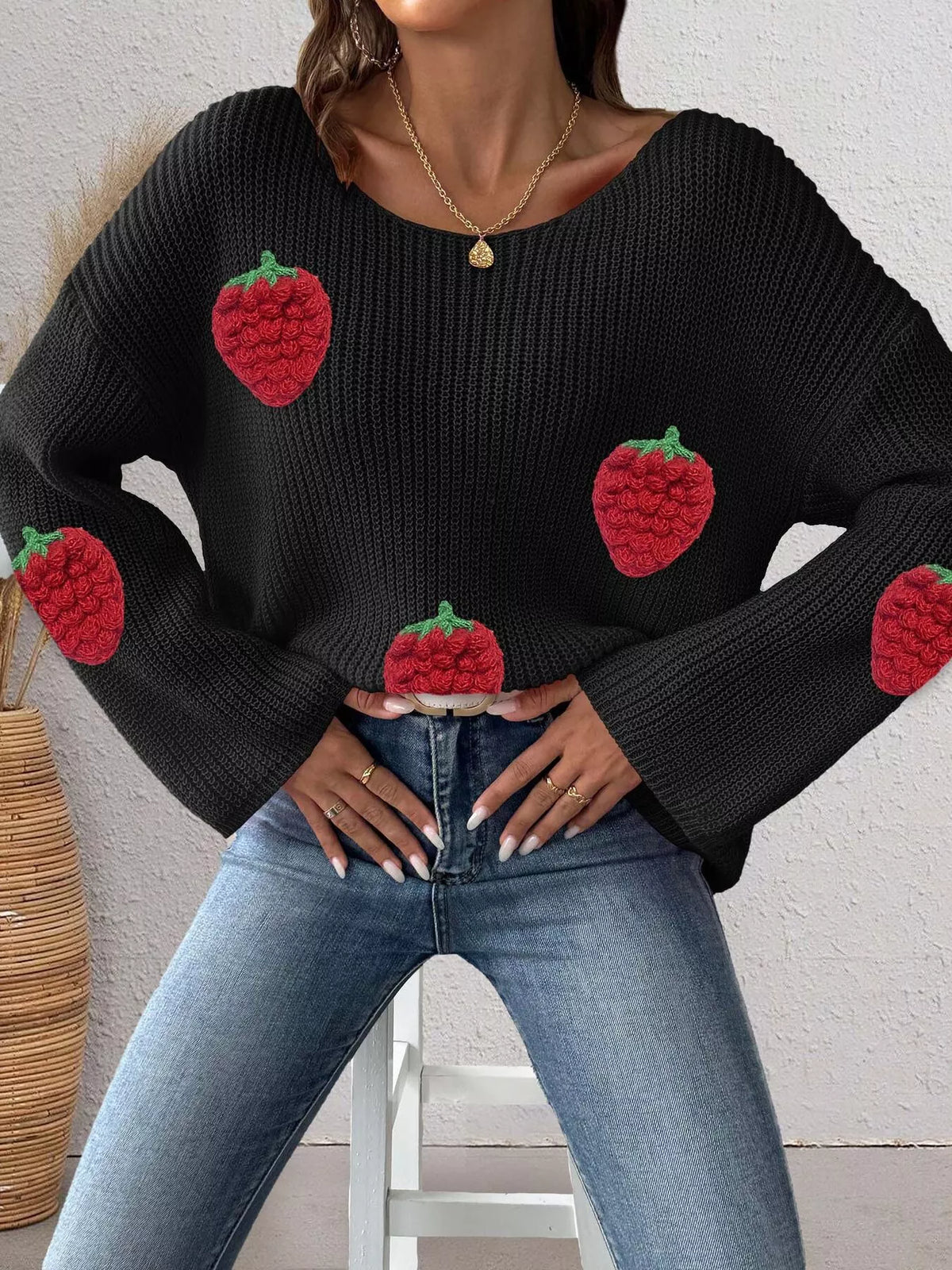 Pink oversized sweater with strawberry applique details, featuring a cozy, relaxed fit from Trendsi's sweater and cardigan collection.