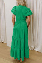 Women's floral ruffled tiered puff sleeve maxi dress by Plush Fashion Hub, featuring elegant long design with ruffle details.