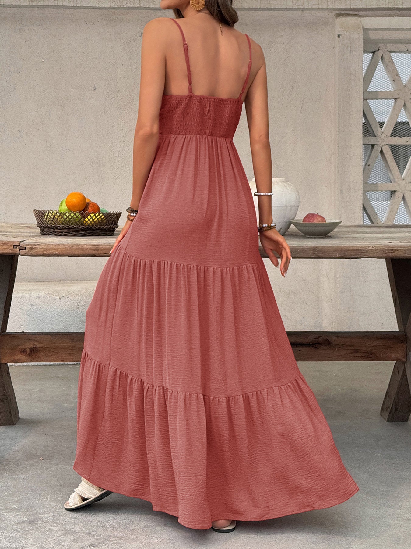 Flowy women's deep V-neck tiered maxi dress with smocked bodice by Plush Fashion Hub, perfect for boho beach style.