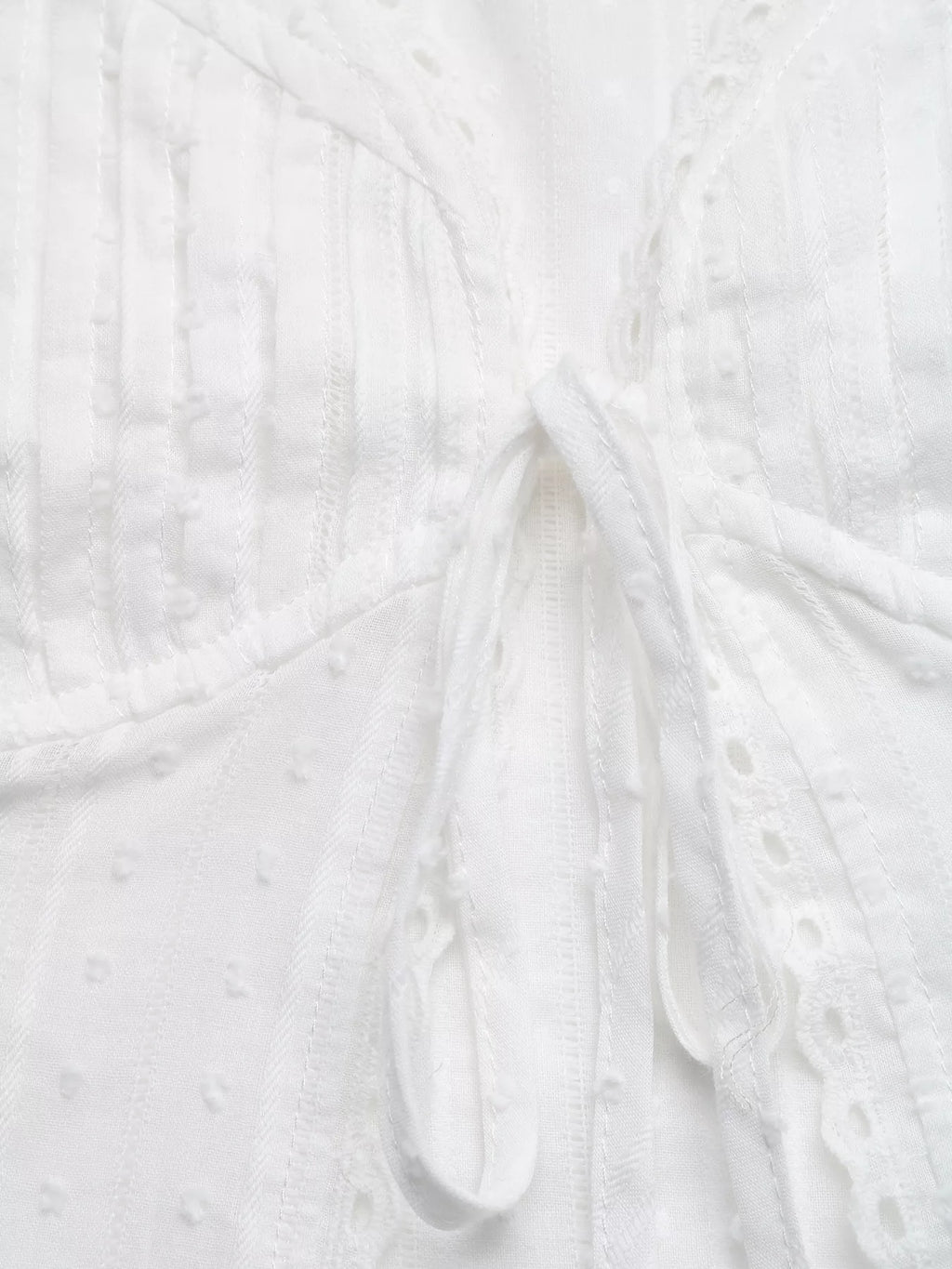 Lace trim tie-front sleeveless tank top from Plush Fashion Hub featuring a stylish, lightweight design with a feminine lace detail.