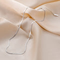 Sterling silver chain necklace with delicate links, crafted from 925 sterling silver, designed for elegant everyday wear.