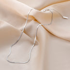 Sterling silver chain necklace with delicate links, crafted from 925 sterling silver, designed for elegant everyday wear.
