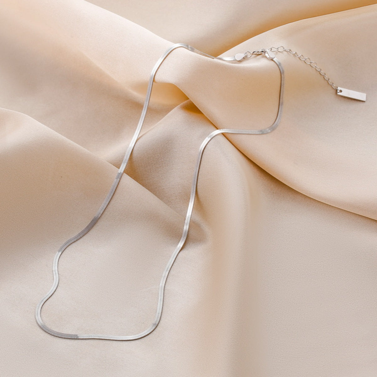 925 Sterling Silver Chain Necklace displayed on a neutral background, showcasing its simple and elegant design.