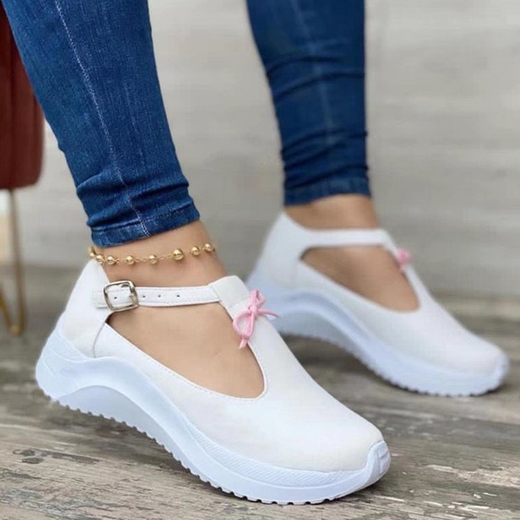 Plush Fashion Hub platform suede sneakers with buckle fringe and solid color design, casual style, and chunky sole.