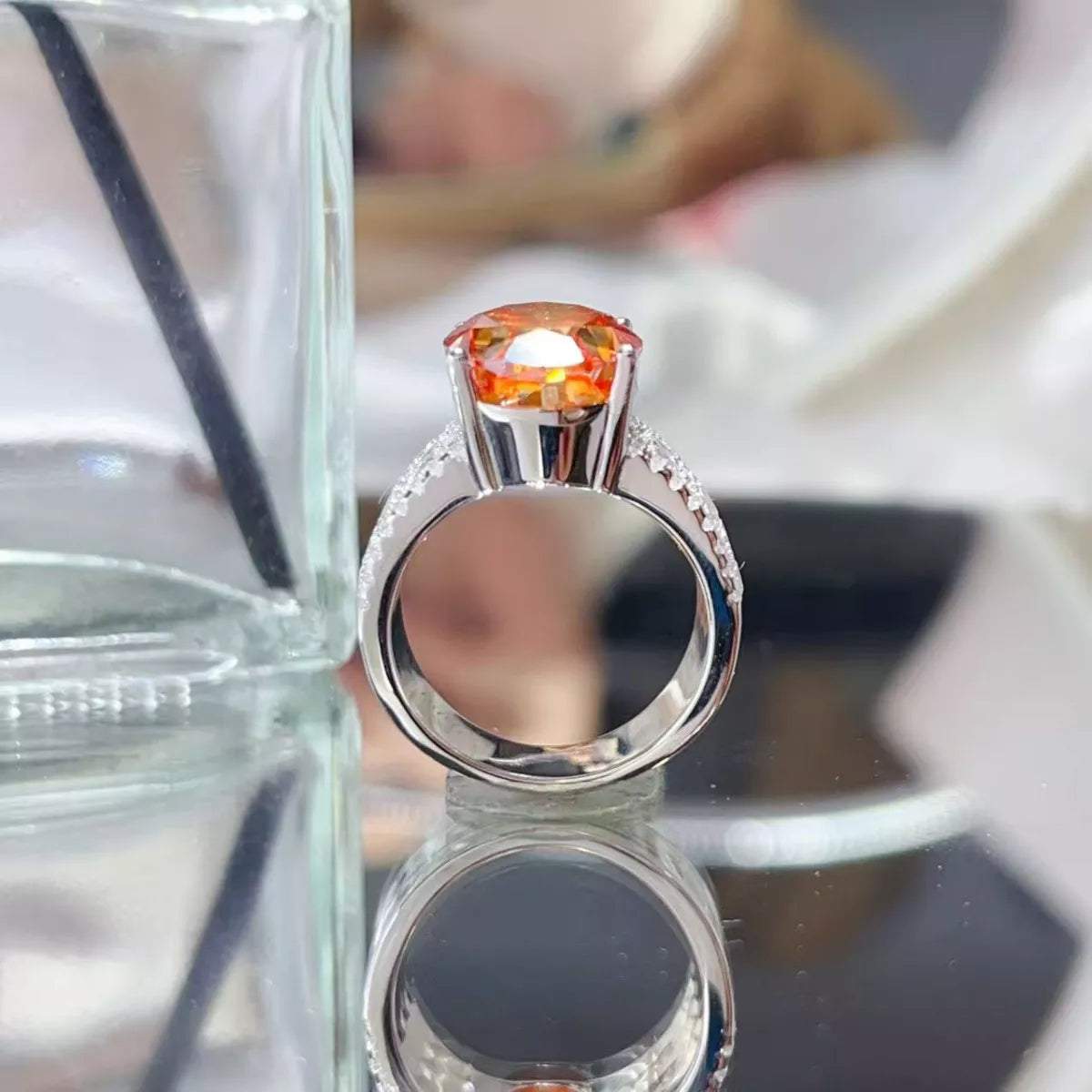 Sterling silver ring featuring an 8-carat moissanite gemstone, showcasing a sparkling, elegant design perfect for special occasions.