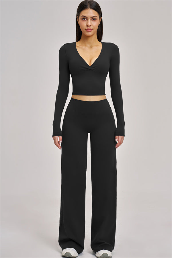 Fitglutes Activewear long sleeve crop top, stylish gymwear with a fitted design, perfect for workout and sports activities.