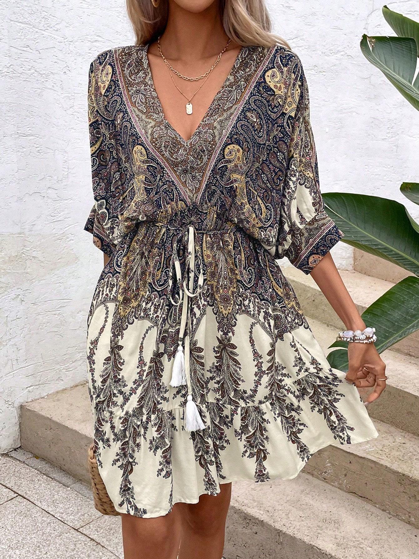 Paisley print batwing sleeve tassel tie front ruffle hem dress by FitiqueFit, casualwear featuring flowy sleeves and a boho-inspired design.