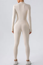 Trendsi half zip mock neck active jumpsuit in sleek, fitted design ideal for workout and athleisure wear.