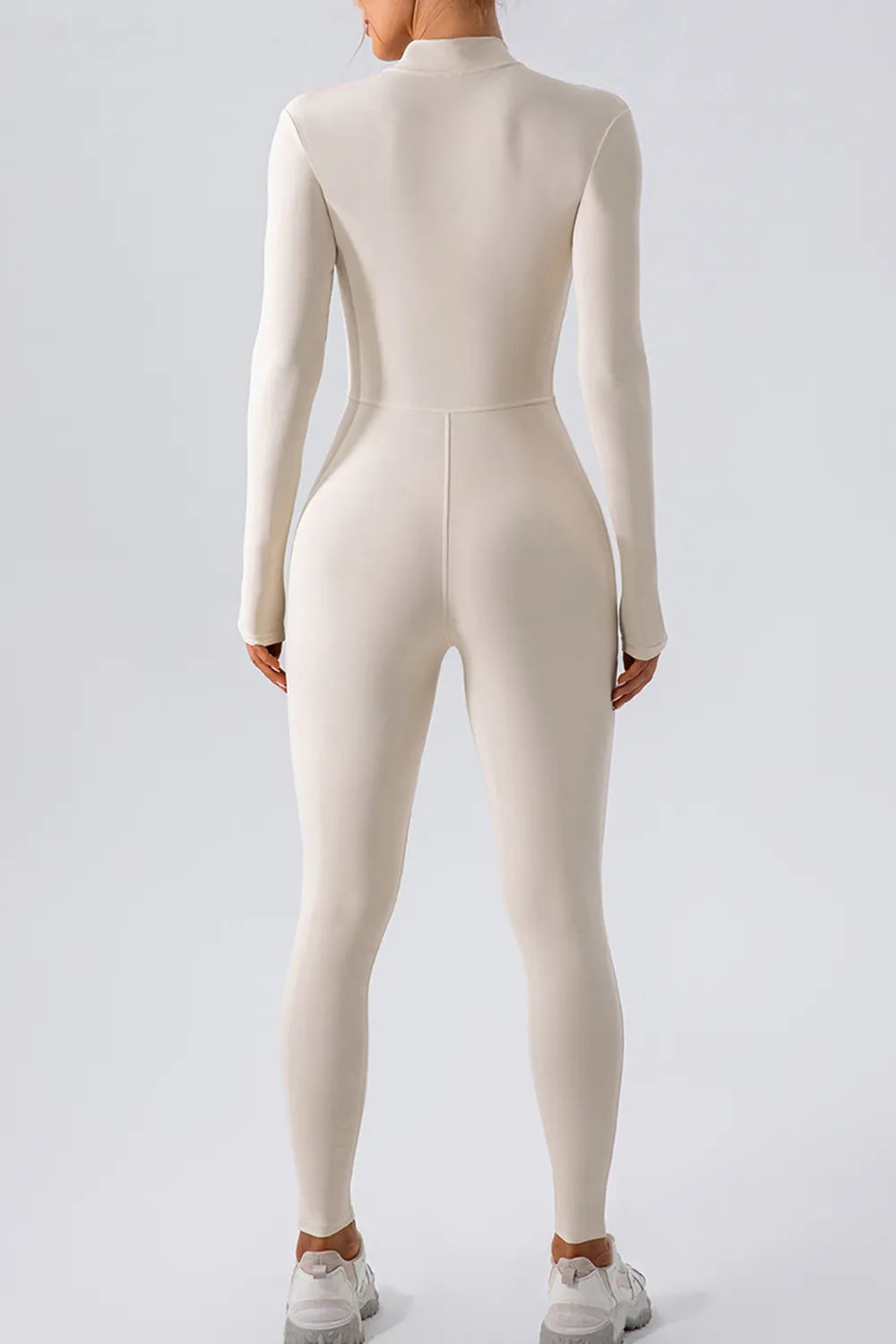 Trendsi half zip mock neck active jumpsuit in sleek, fitted design ideal for workout and athleisure wear.