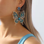 Butterfly rhinestone dangle earrings by Shopimist featuring sparkling rhinestones and delicate butterfly design for elegant wear.