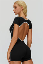 Fitglutes The Whisper Romper displayed on a model, featuring a fitted athletic design ideal for gym and workout activities.