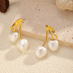 Pearl cherry drop earrings by Shopimist featuring elegant dangling pearls with small red cherry accents.