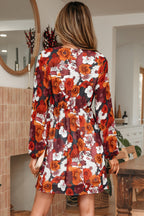 Flowy Marianna Sleeve Mini Dress by Threaded Pear featuring a floral pattern and short sleeves, perfect for summer or casual occasions.