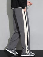 Men's plus size casual loose pants with side stripes by Shopimist, featuring a relaxed fit and stylish striped design.