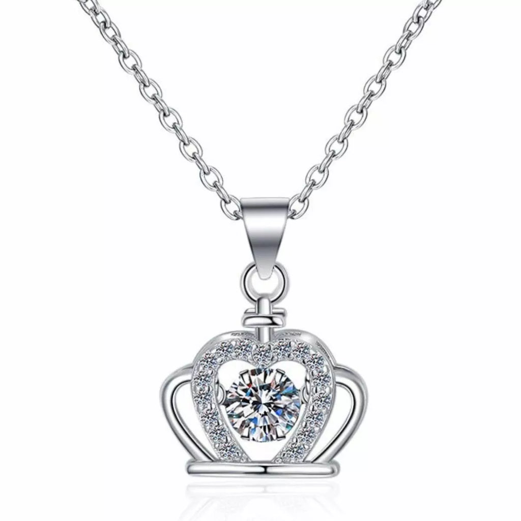 Sterling silver zircon crown pendant necklace featuring a detailed crown design, crafted by Shopimist.