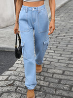 High-waisted cargo denim jeans from Plush Fashion Shop with multiple pockets and relaxed fit, shown on a model.
