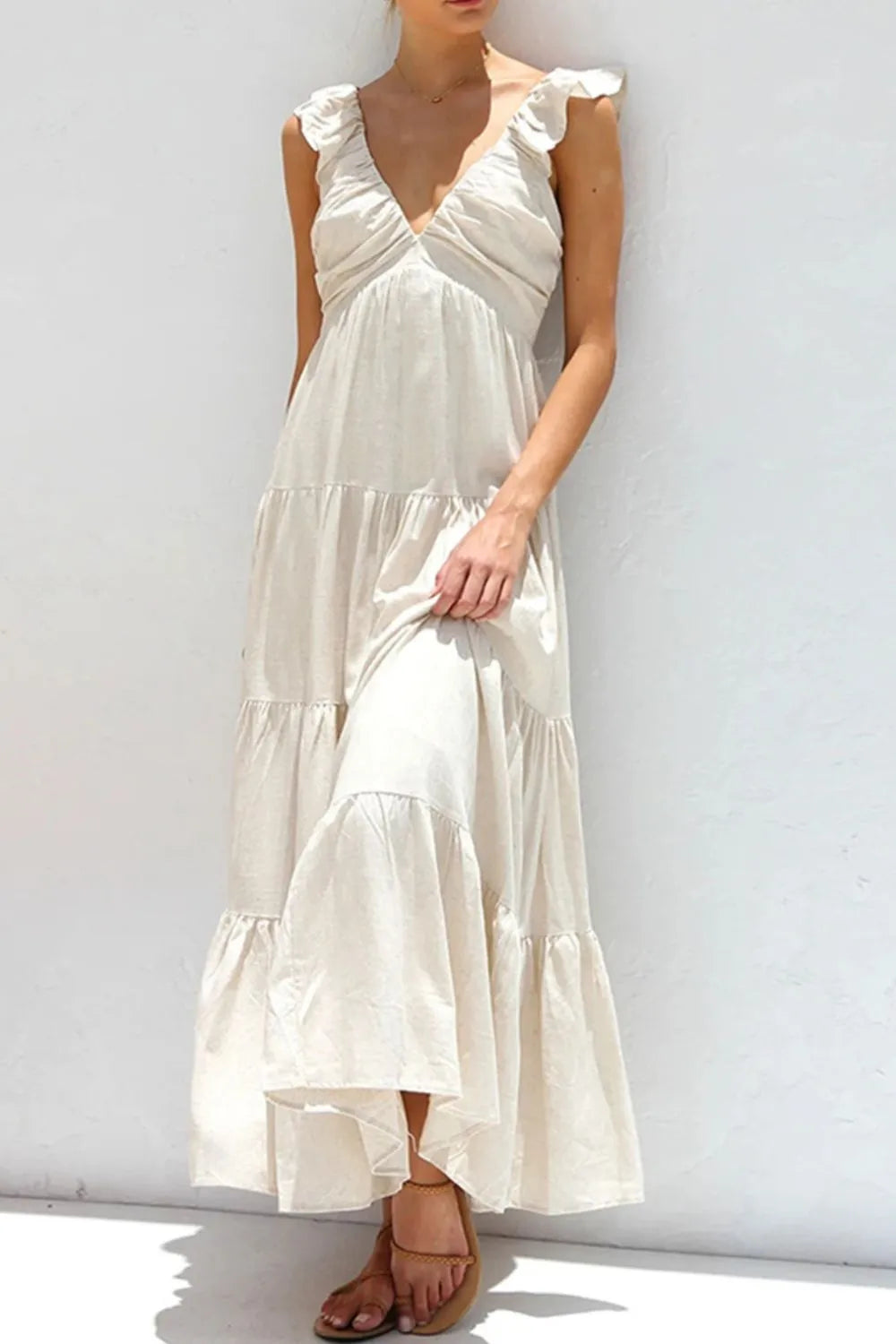 Women’s plush Fashion Hub cotton ruffled v-neck tiered midi dress, featuring a flowy silhouette and tiered design.