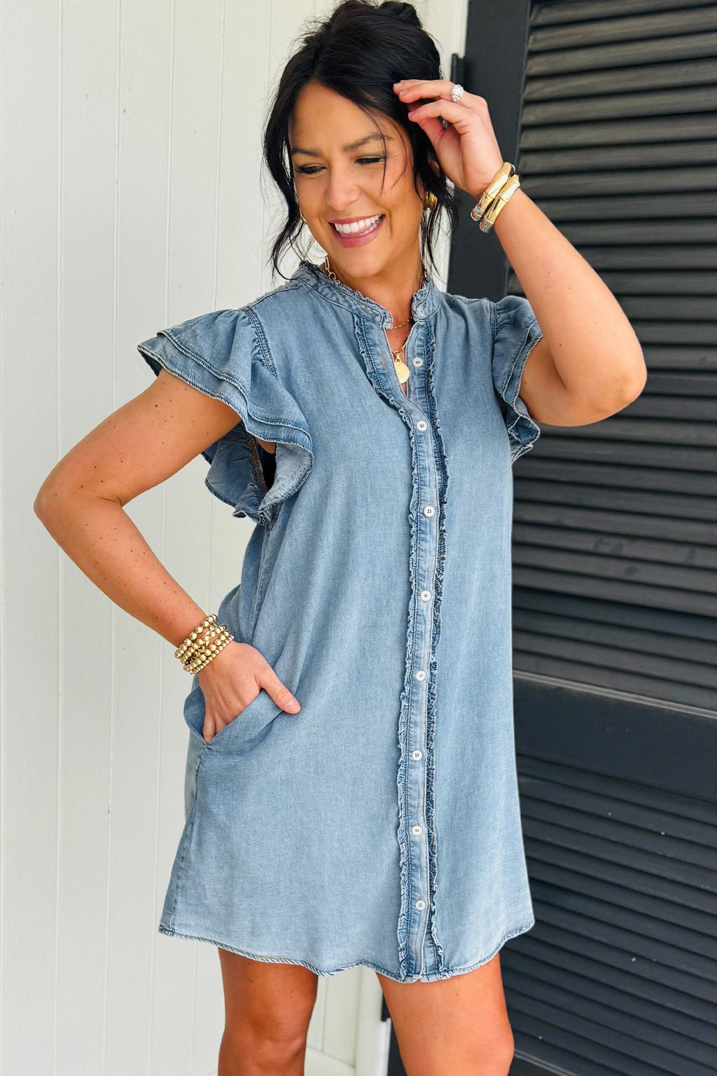 Threaded Pear Sasha short sleeve mini dress displayed on a model, featuring a fitted silhouette and stylish design.
