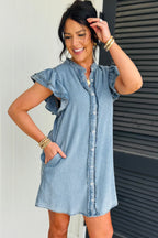 Threaded Pear Sasha short sleeve mini dress displayed on a model, featuring a fitted silhouette and stylish design.
