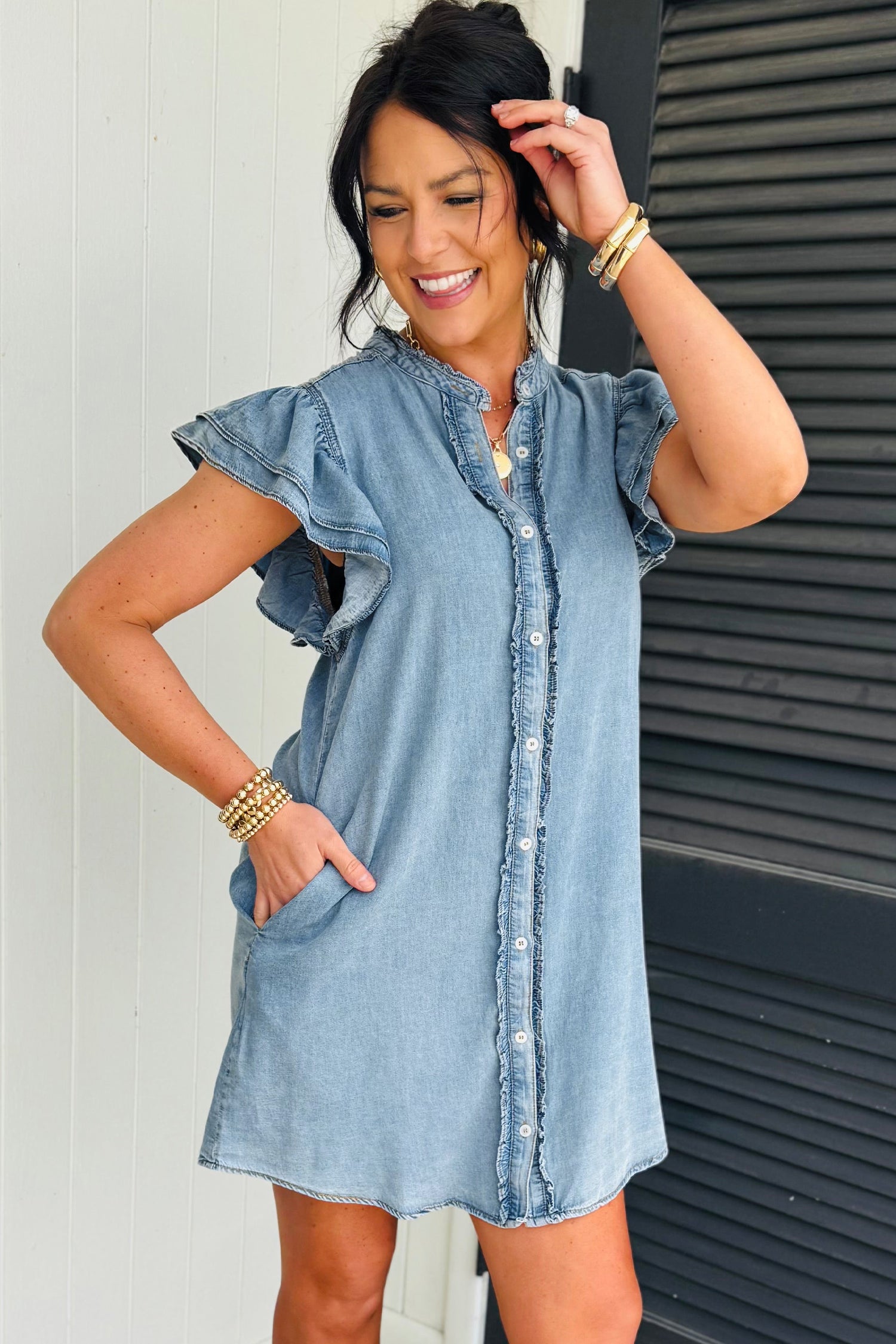 Threaded Pear Sasha short sleeve mini dress displayed on a model, featuring a fitted silhouette and stylish design.