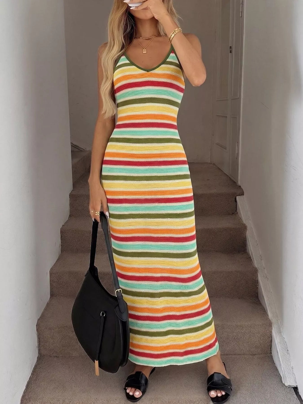 Striped bodycon knit midi dress from Trendsi featuring a fitted silhouette and stylish horizontal stripe pattern.