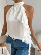 White chic ruffle halter neck sleeveless blouse for women, stylish office top by Trendsi, featuring ruffle details and elegant design.