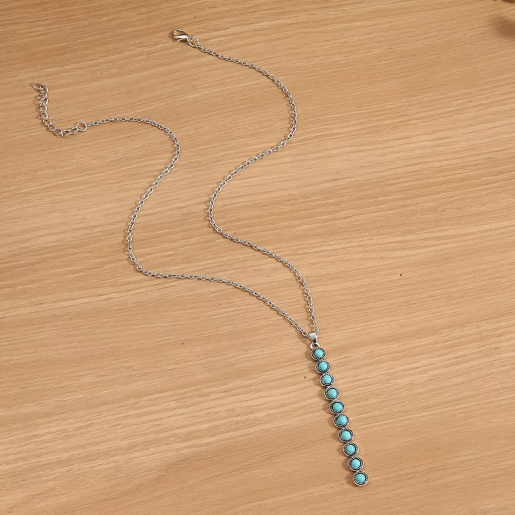 Vintage style beaded bar necklace with colorful beads and gold-tone chain, showcasing a trendy jewelry piece from Shopimist.