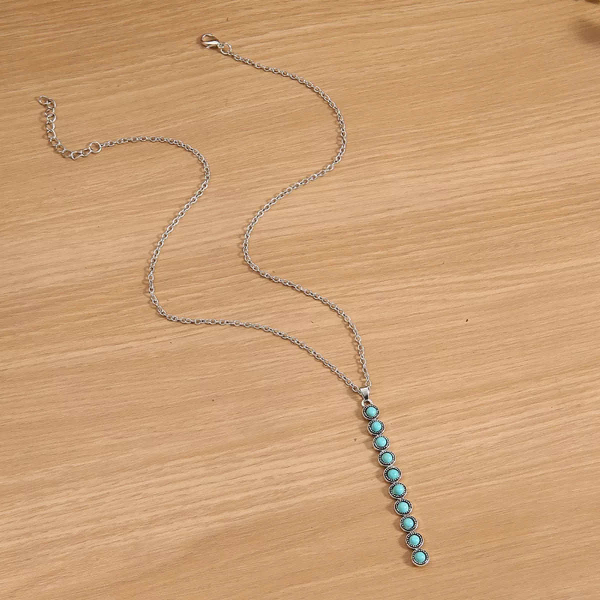 Vintage style beaded bar necklace with colorful beads and gold-tone chain, showcasing a trendy jewelry piece from Shopimist.