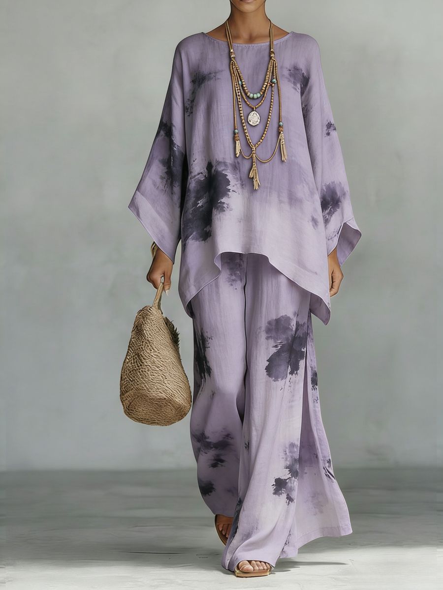 Floral print bamboo linen two-piece set with wide-leg pants by FitiqueFit, shown on a model in a stylish outdoor setting.