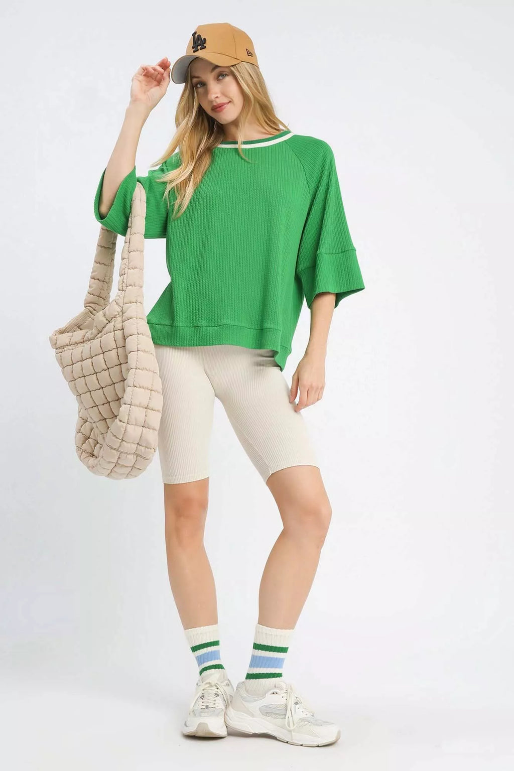 FitiqueFit Umgee ribbed knit top with contrast trim, showcasing a stylish long-sleeve design and textured fabric.