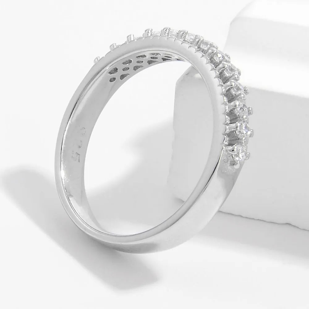 Sterling silver ring with zircon inlay, featuring a sleek design and polished finish, ideal for elegant jewelry collection.